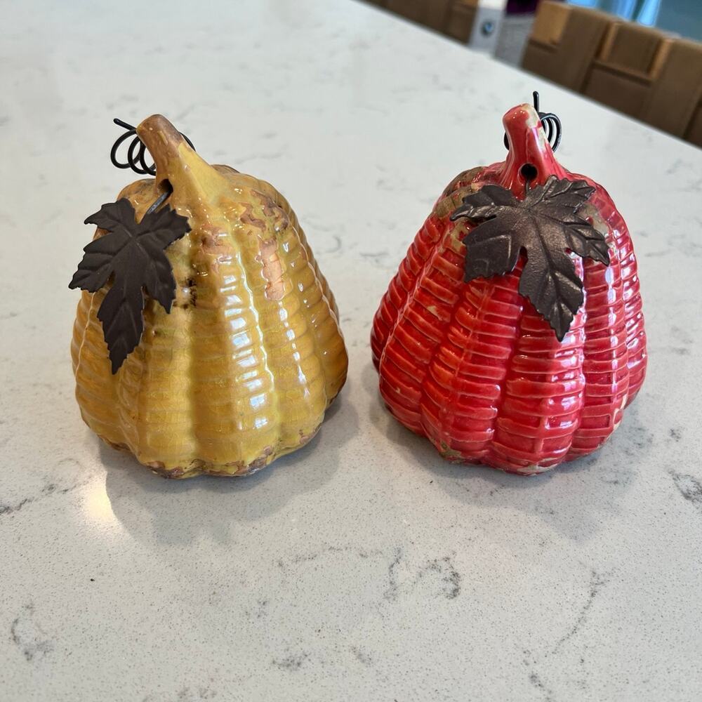 Two distressed pumpkins